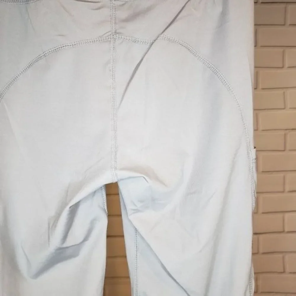 NWT JVINI gray leggings with sheer‎ side pa…